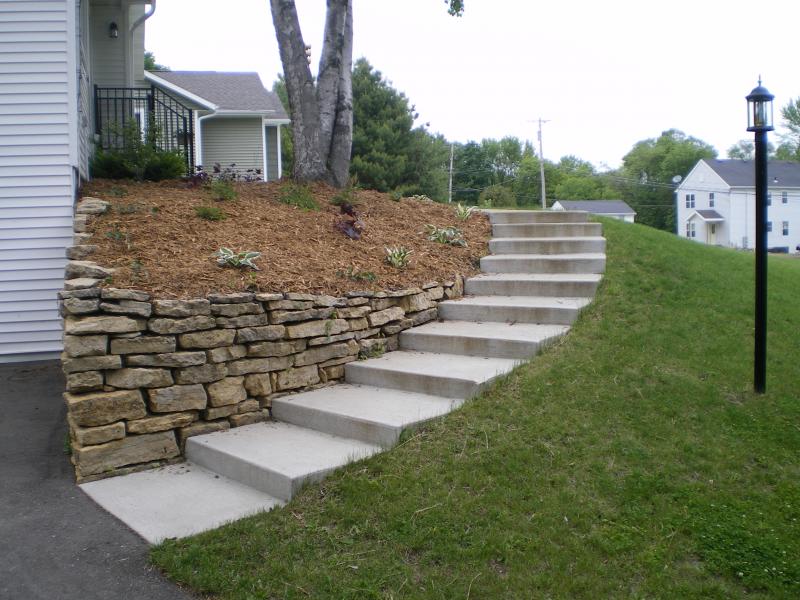 Flagstone Wall Retaining wall Lawn Care Landscaping work